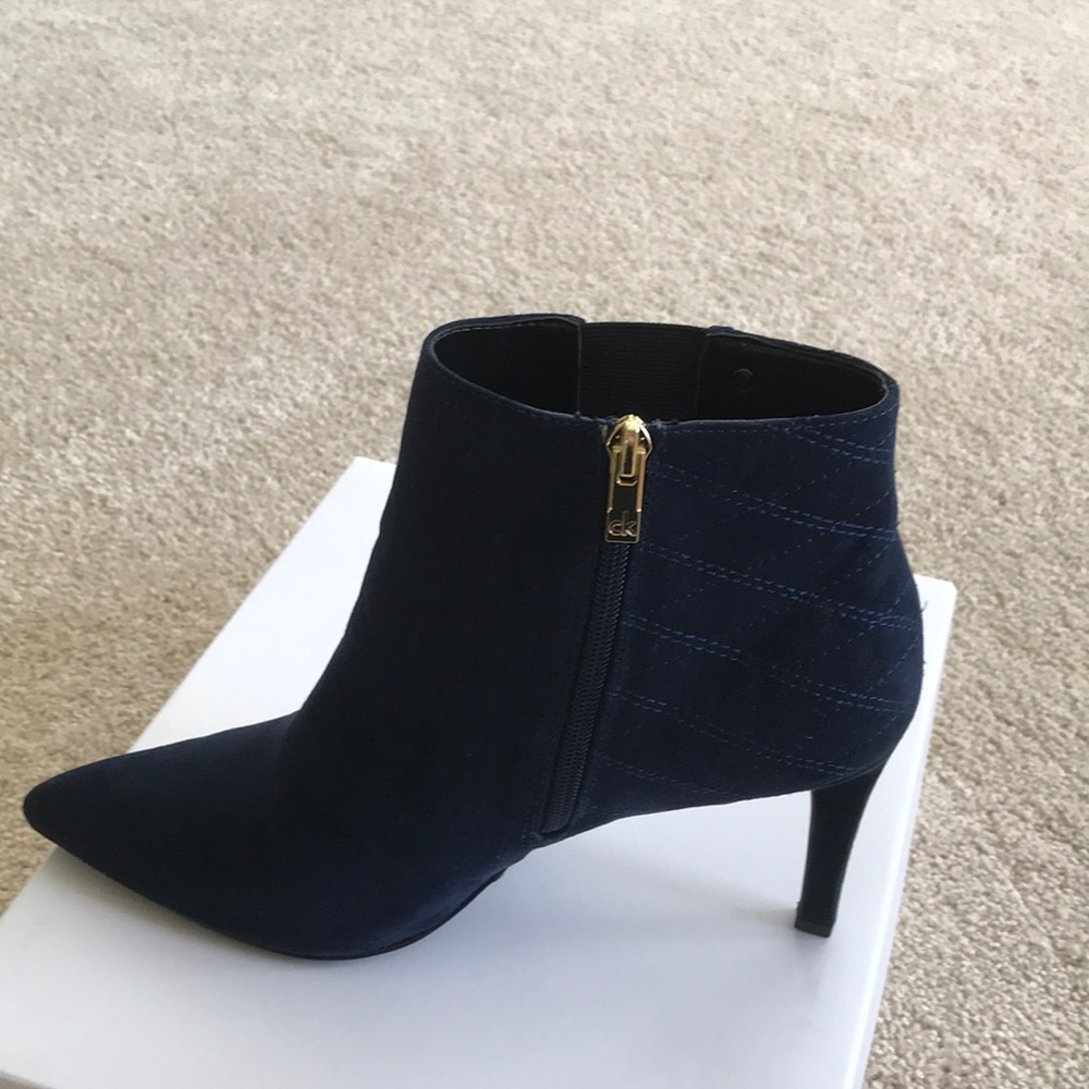 Calvin Klein women’s navy ankle boots size 11.